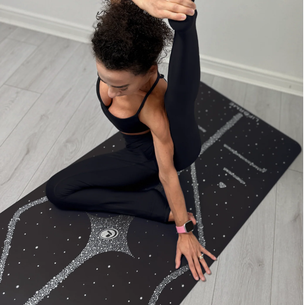 Liforme_Magic_Galaxy_Yoga_Mat_Silver_Black_Lifestyle_5.png.webp